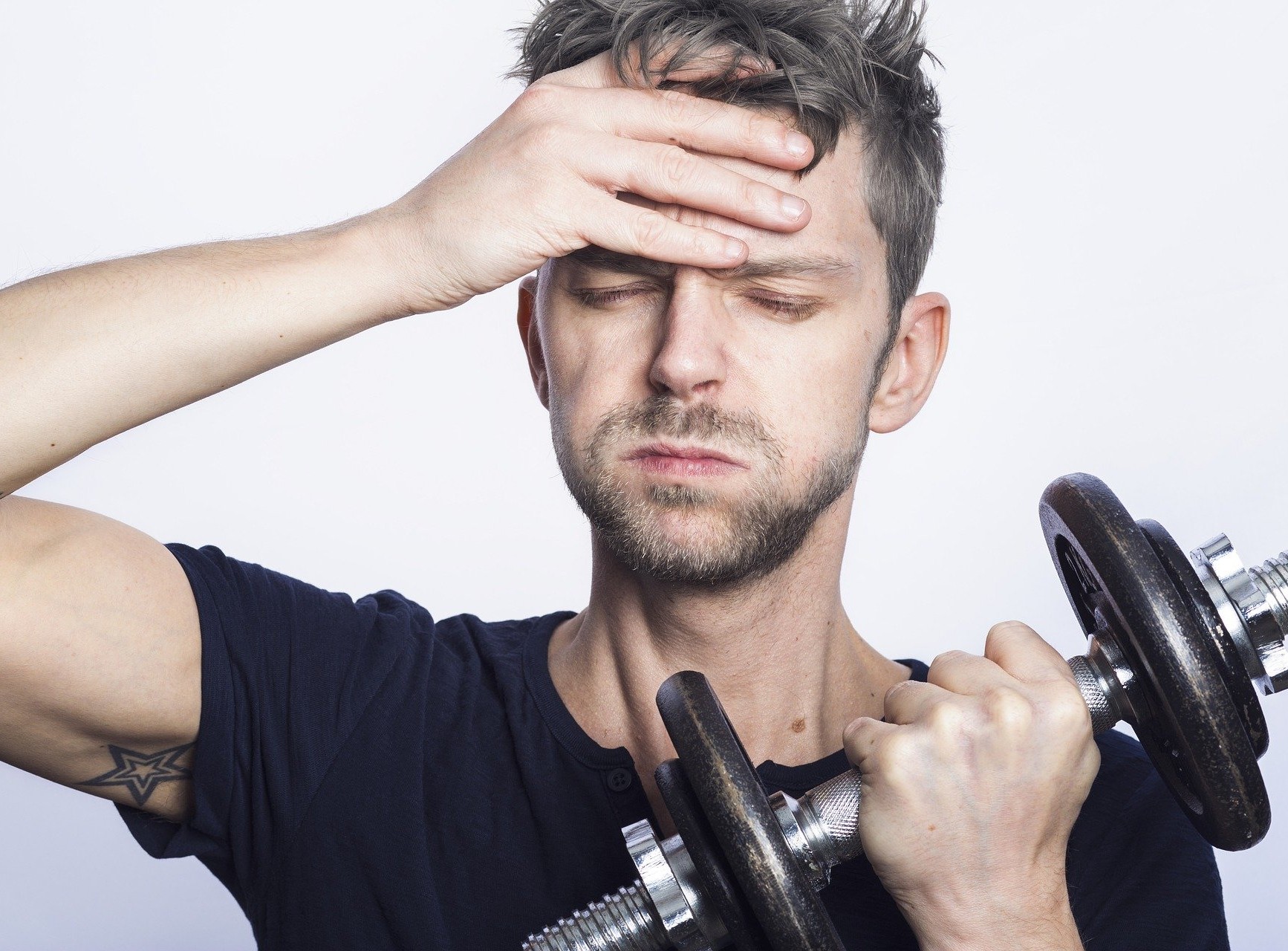 Erschöpfter Sportler Erschöpfter Sportler